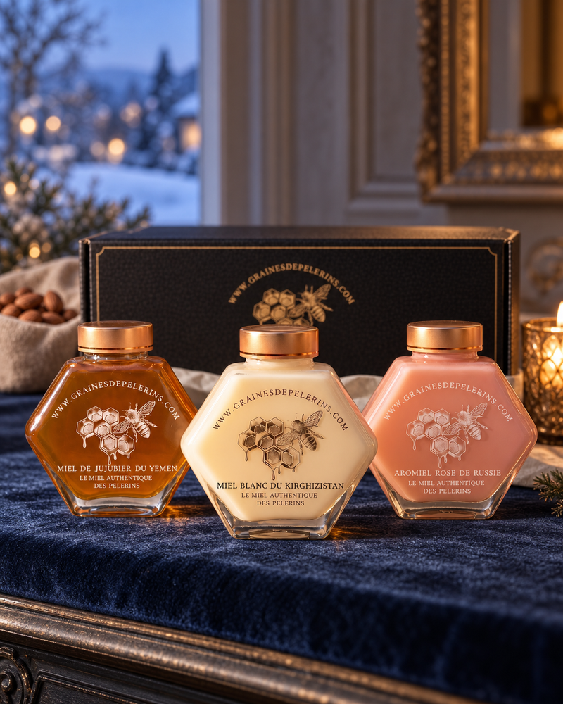 Die drei Honige der Prestige-Box, Jujubier, Weißer Honig und Aromiel Rose, vor ihrem großen Etui.